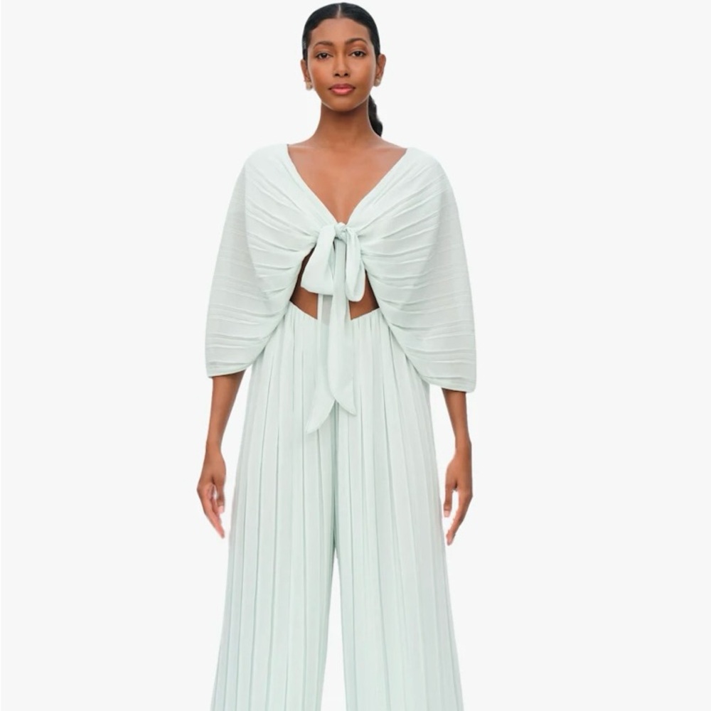 Size 12 mint blue andrea iyamah jumpsuit . Never worn before tags still on.